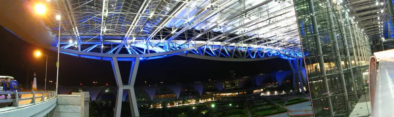 Suvarnabhumi Airport Bangkok terminal exterior by night where Australian flights connect to Koh Samui