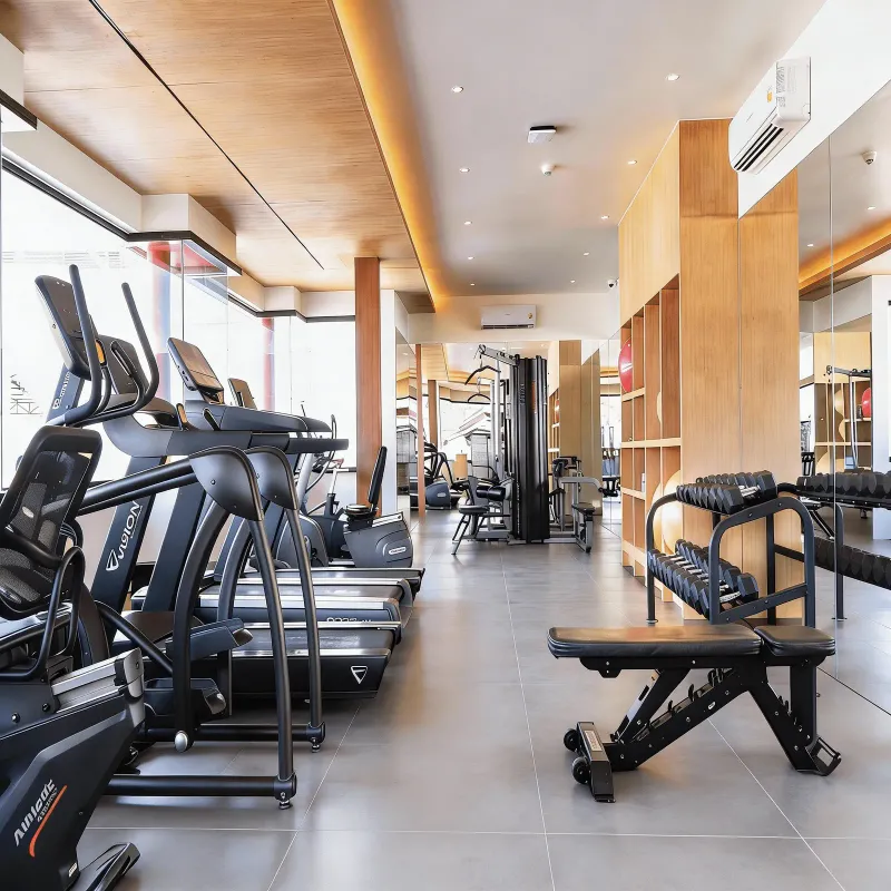 Fitness centre with treadmills, cross trainers and free weights at Chaweng Regent Beach Resort