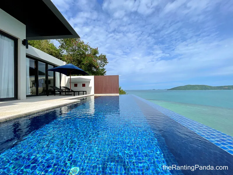 Private infinity pool of a Conrad Koh Samui pool villa looking out over the Gulf of Thailand