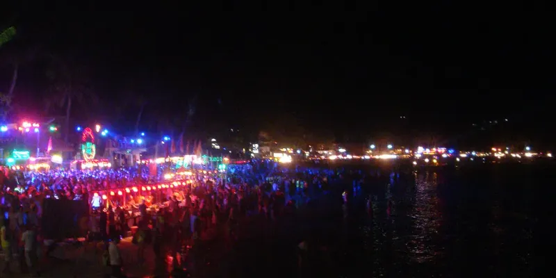 The bars light up along the shore