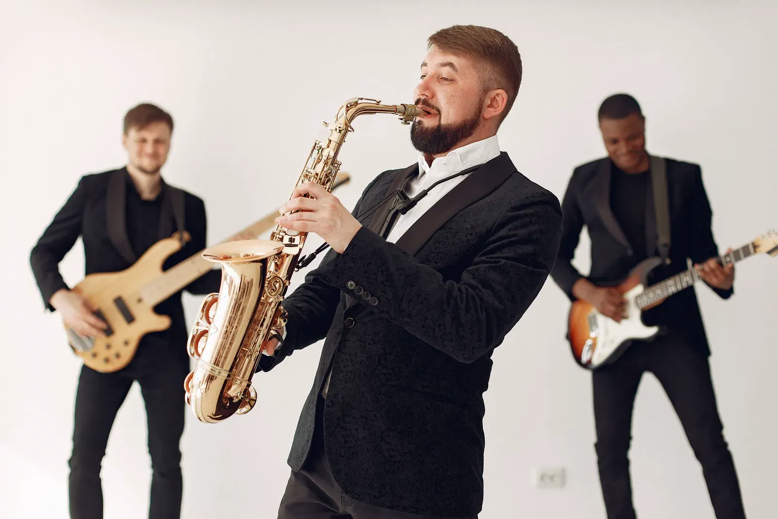 Saxophonist playing with a live band