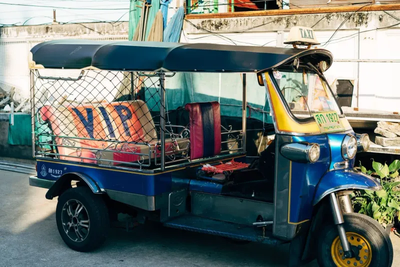 Colorful tuk-tuk style taxi, a shared-transport vehicle style seen across Thailand