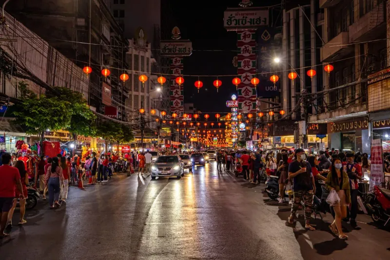 Lantern-lit street scene with market stalls typical of a Koh Samui walking street evening