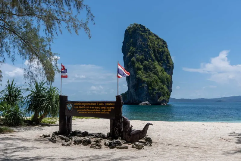 Koh Poda island beach with limestone rock and clear water near Krabi
