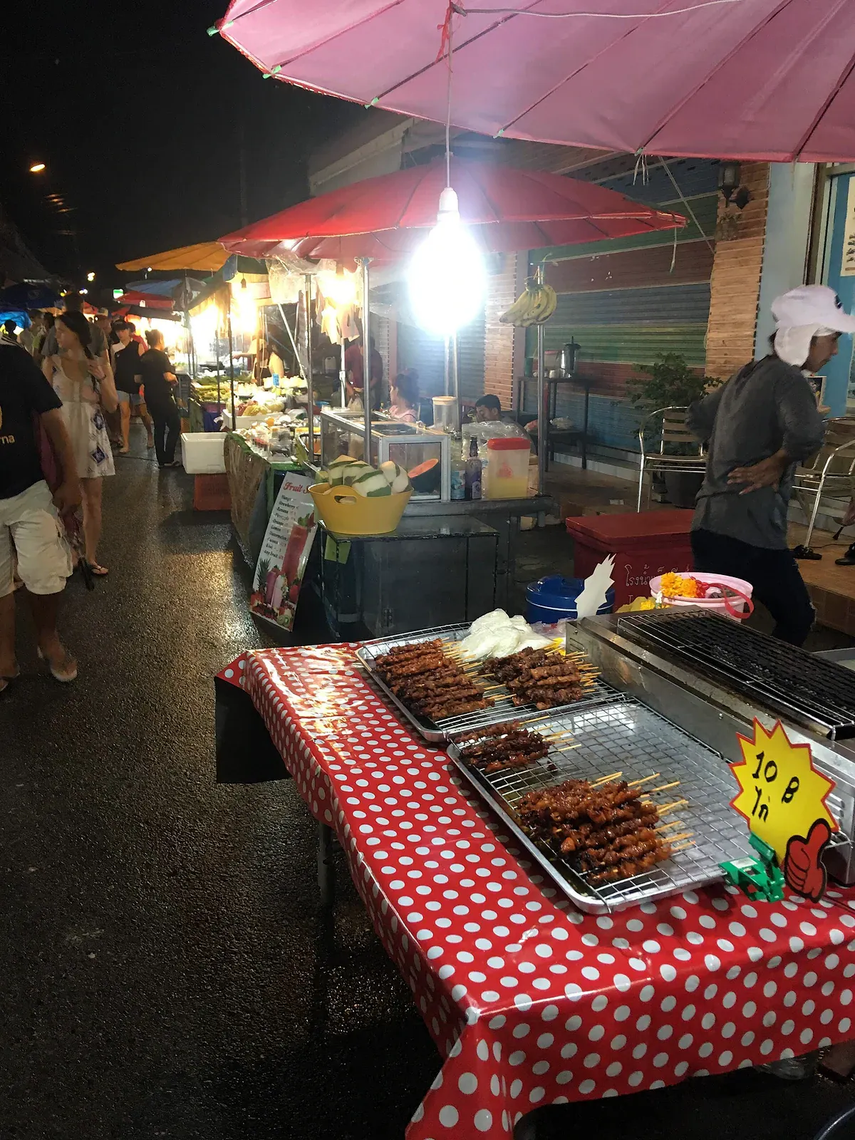 Grilled skewers and food stalls at the Lamai Sunday night market on Koh Samui