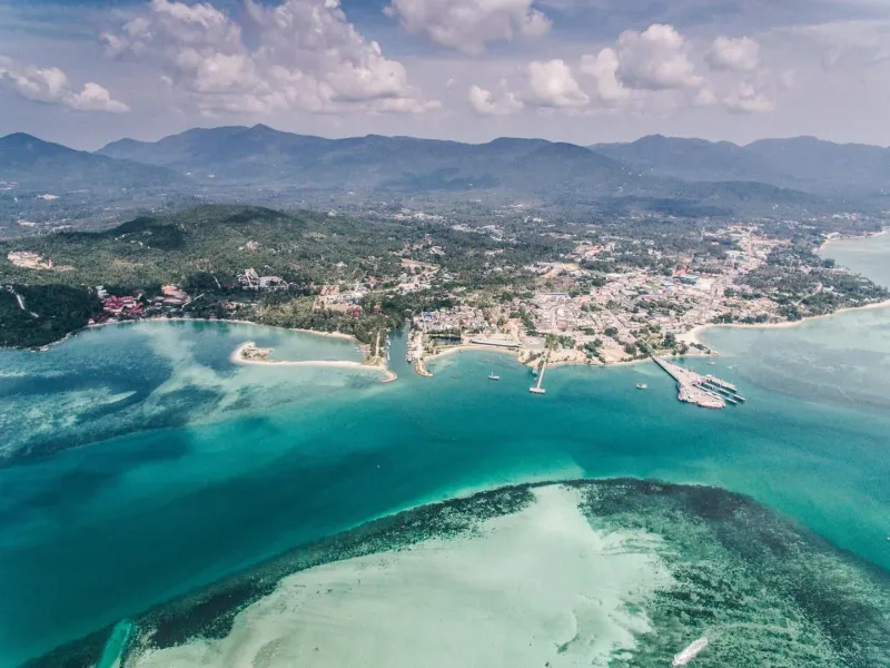 Aerial view of a tropical coastal town near Bophut's Fisherman's Village, Koh Samui