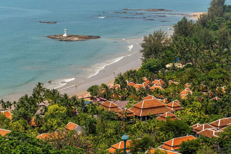 Aerial view of a coastal village with terracotta roofs near Koh Samui in December