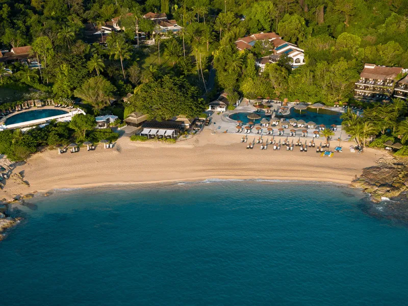 Aerial view of Tong Sai Bay's curved sand cove framed by granite headlands