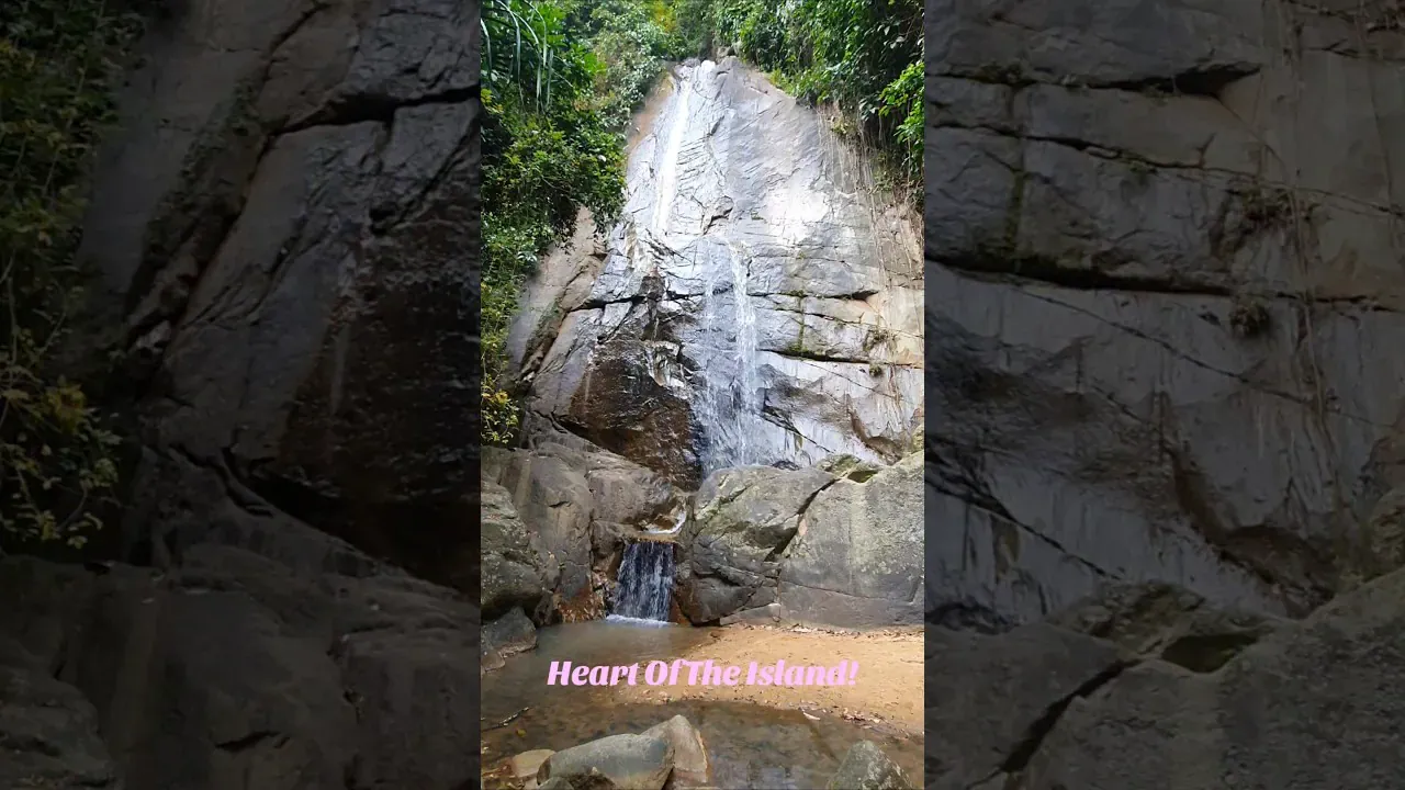Zong Raue Waterfall's gentle cascade and rock pools inside the fruit plantations
