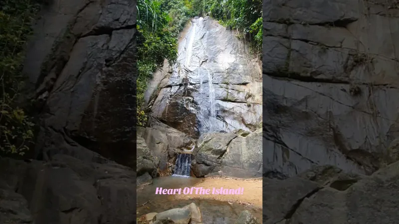 Zong Raue Waterfall's gentle cascade and rock pools inside the fruit plantations